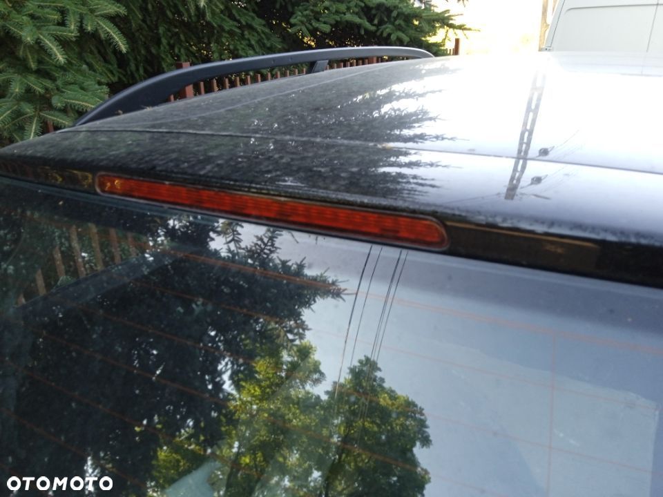 ŚWIATŁO STOP KLAPY Z LISTWĄ  AUDI A4 B7 KOMBI 04-07 - 1