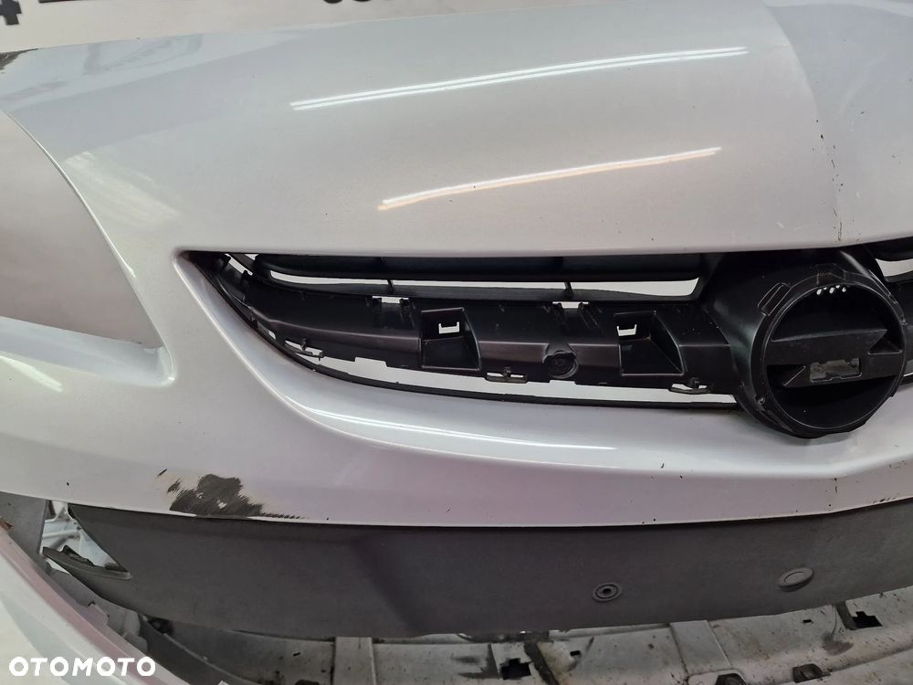 OPEL ASTRA IV LIFT 12- ZDERZAK PRZEDNI PRZÓD , NA SPRYSKI + ATRAPA / GRILL + HOKEJE , NR 13368660 , NR AUKCJI NZ1350 - 5