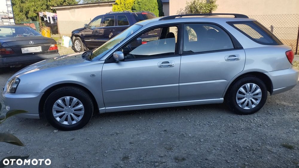 Subaru Impreza 1.6 TS - 4