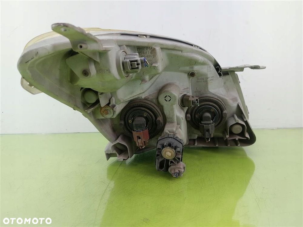 Reflektor lampa przód lewa Toyota Corolla Verso I 2001-2004 UPM60GF20 - 2
