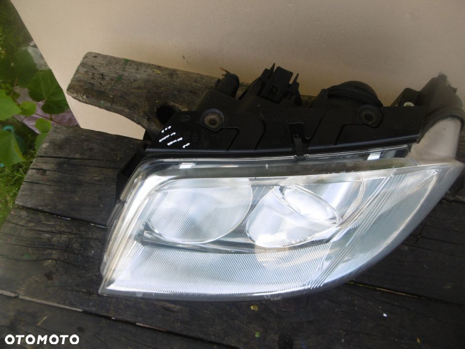 lampa lewa Passat B5 FL Hella Europa - 2