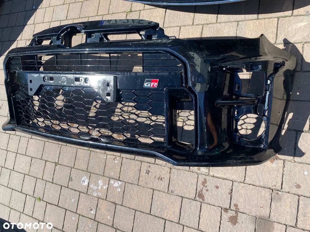 YARIS GR IV 20-ZDERZAK PRZOD BD ORG - 1