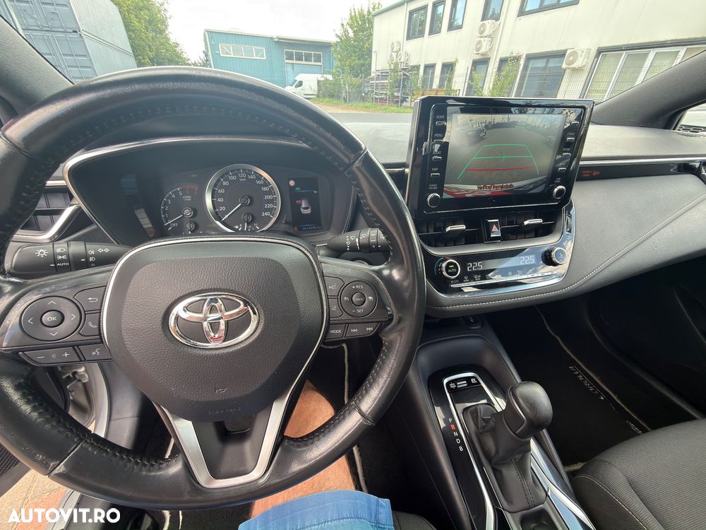Toyota Corolla 1.8 HSD Business - 14