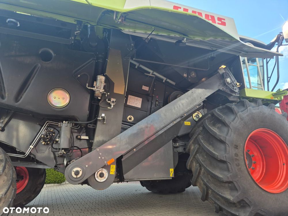 Claas Tucano 440 z hederem Vario 620 i przystawką do kukurydzy Olimac - 15