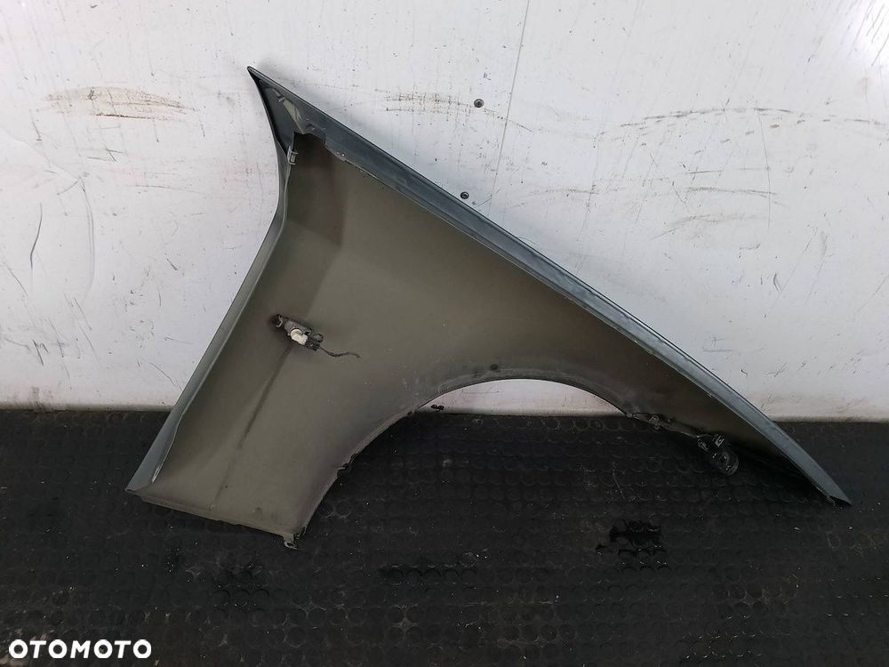 BŁOTNIK LEWY PRZÓD BMW E91 A81/6 - 7