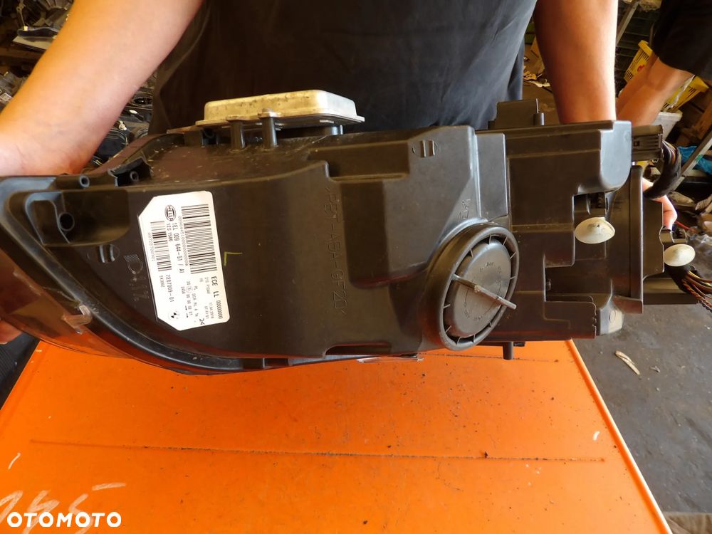 BMW - E71,X6 - XENON - URWANE UCHO - LEWA LAMPA PRZEDNIA - EUROPA - 7287009 - 9