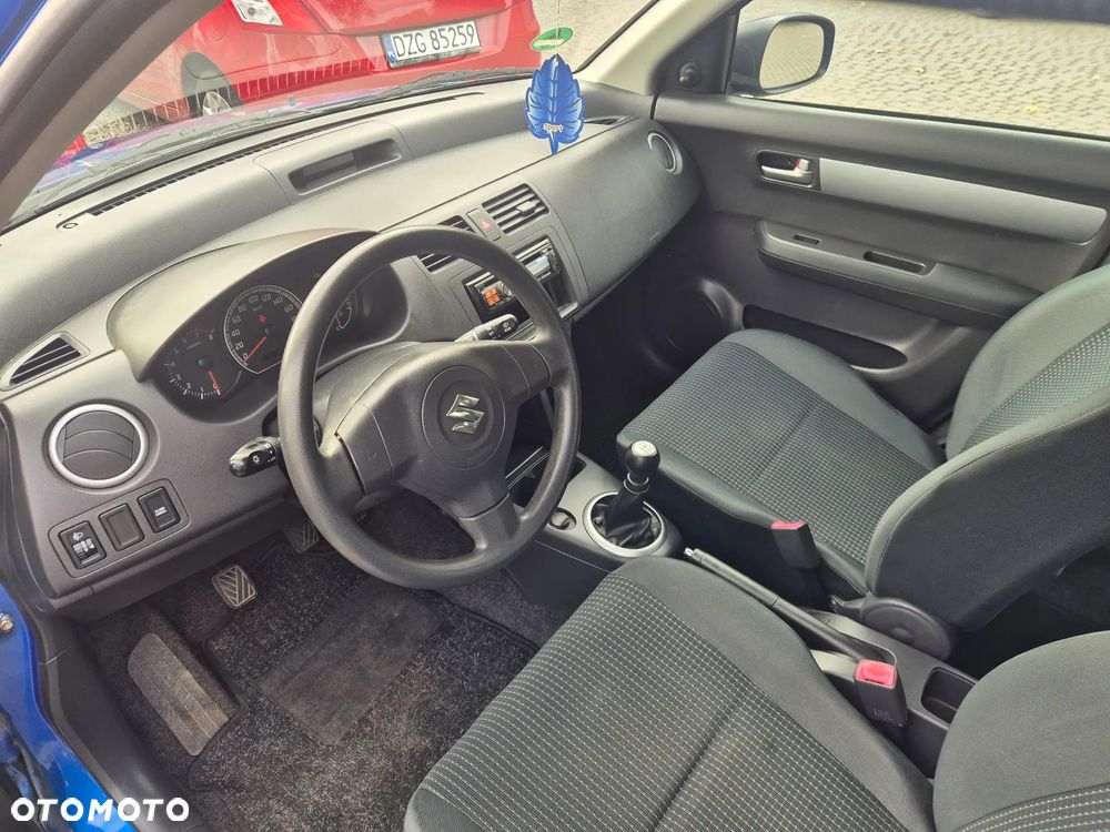 Suzuki Swift 1.3 Club - 11