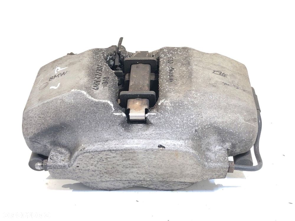 ZACISK LEWY PRZÓD  BMW 5 (G30, F90) 2016 - 2022 530 e Plug-in-Hybrid 135 kW [184 KM] Hybryda silnik - 1