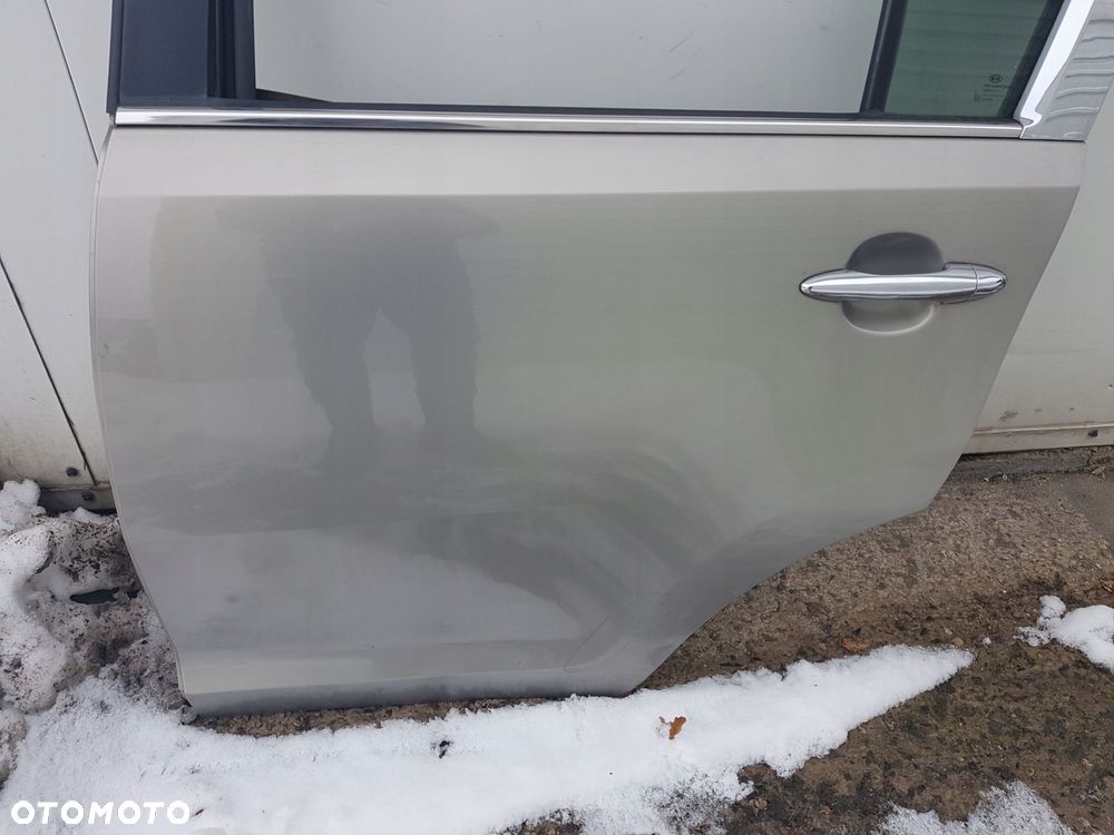 KIA SPORTAGE 3 III 10-15r DRZWI LEWE TYŁ TYLNE A3 - 2