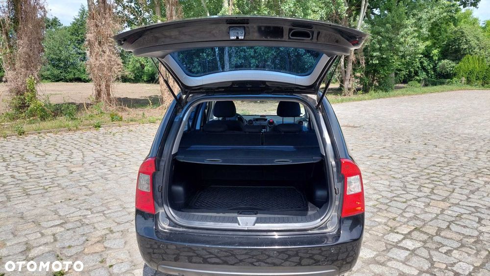 Kia Carens - 7