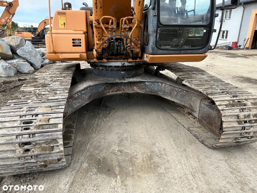 Case CX240 - 4