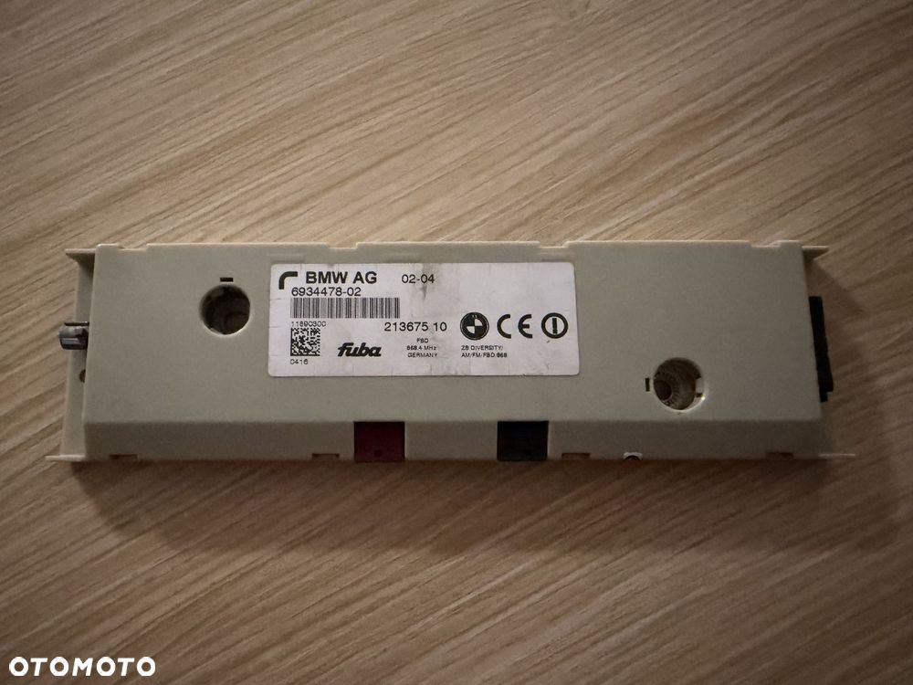 Wzmacniacz antenowy Diversity BMW 6934478 E60 E61 E91 E70 E71 oryginał - 1