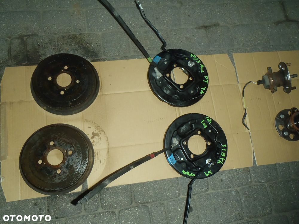 bęben szczęki cylinderek rozpierak hamulec tylny osłona tarcza kotwiczna kostka abs z zawieszenie tył toyota yaris II III 2 3 jak nowe - 8