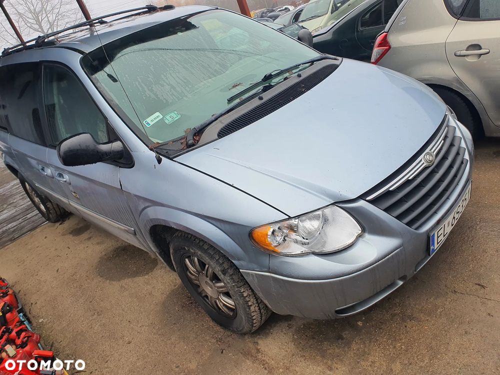 chrysler voyager IV lift fotel kanapa deska kokpit podsufitka boczek podłokietnik licznik - 1