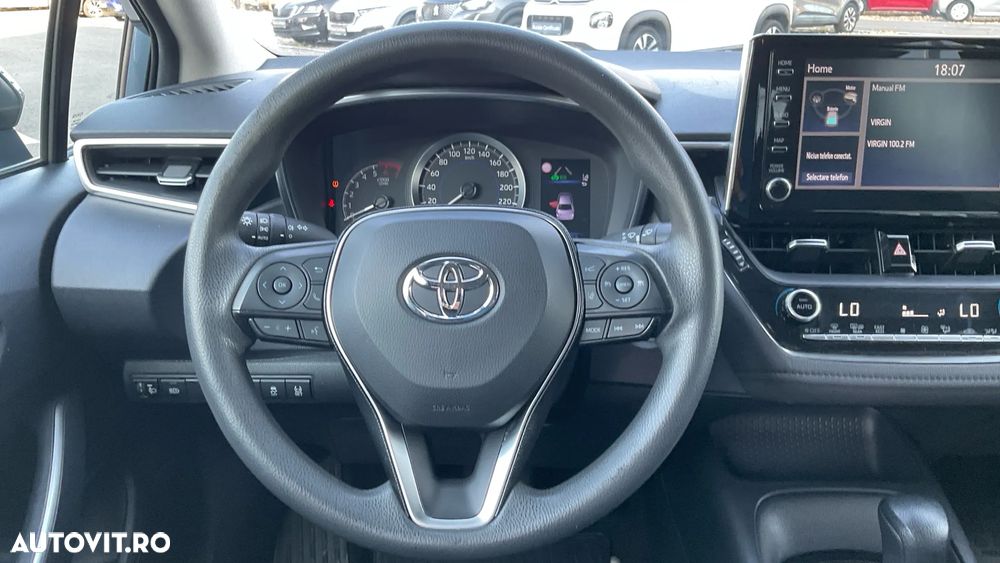 Toyota Corolla Sedan 1.8 HSD Business - 9
