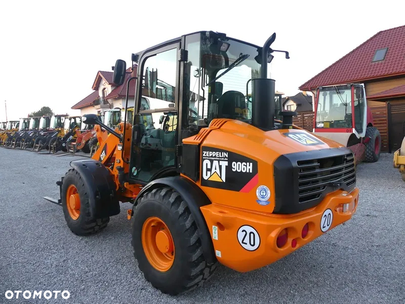 Caterpillar CAT 906H / Z Niemiec / 6424mtg / - 2