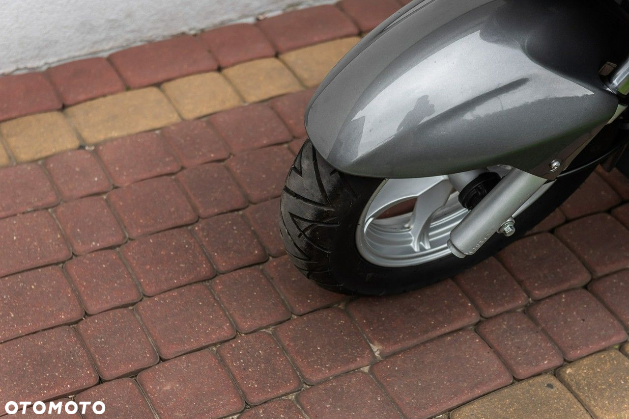 Suzuki Burgman - 7