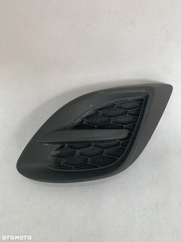 Mazda 2 II FL 10-14r Atrapa kratka lewa zderzak lift