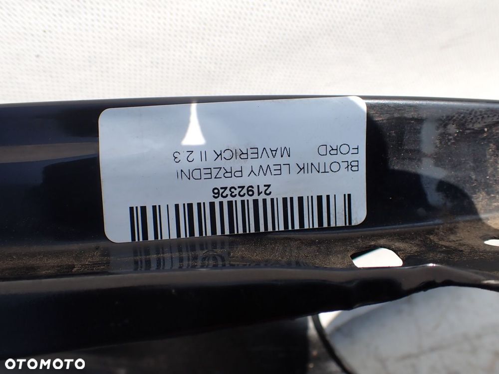 BŁOTNIK LEWY PRZEDNI FORD MAVERICK II 2.3 - 9