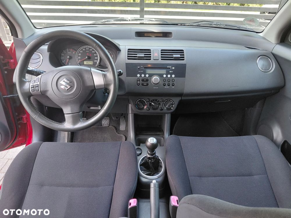 Suzuki Swift 1.3 Club - 11