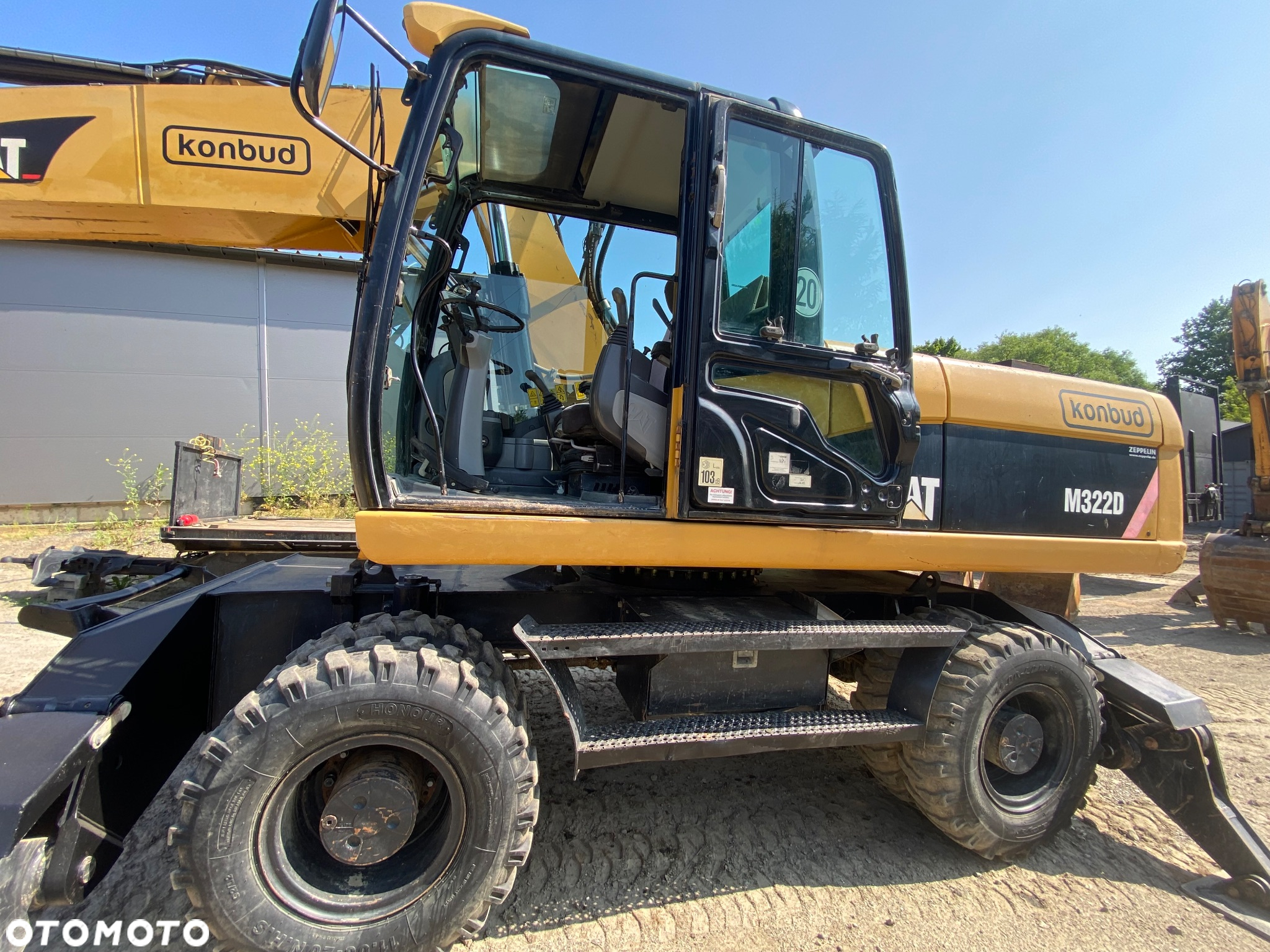 Caterpillar M322D - 15