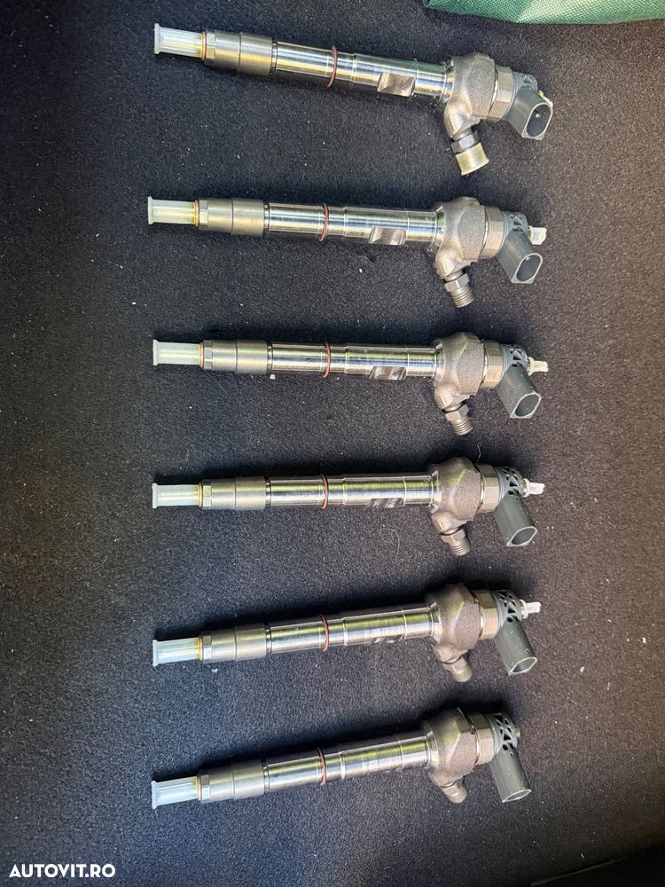 Vand 6 injectoare noi si originale Bosch, cod 03L 130 277 P. Compatibile cu Volkswagen Passat, Golf, Tiguan, Audi A4, A6, SEAT Leon, Skoda Octavia, etc. - 1