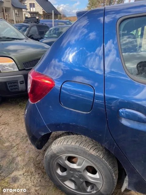 BŁOTNIK ĆWIARTKA PRAWA TYŁ DACIA SANDERO II - 1