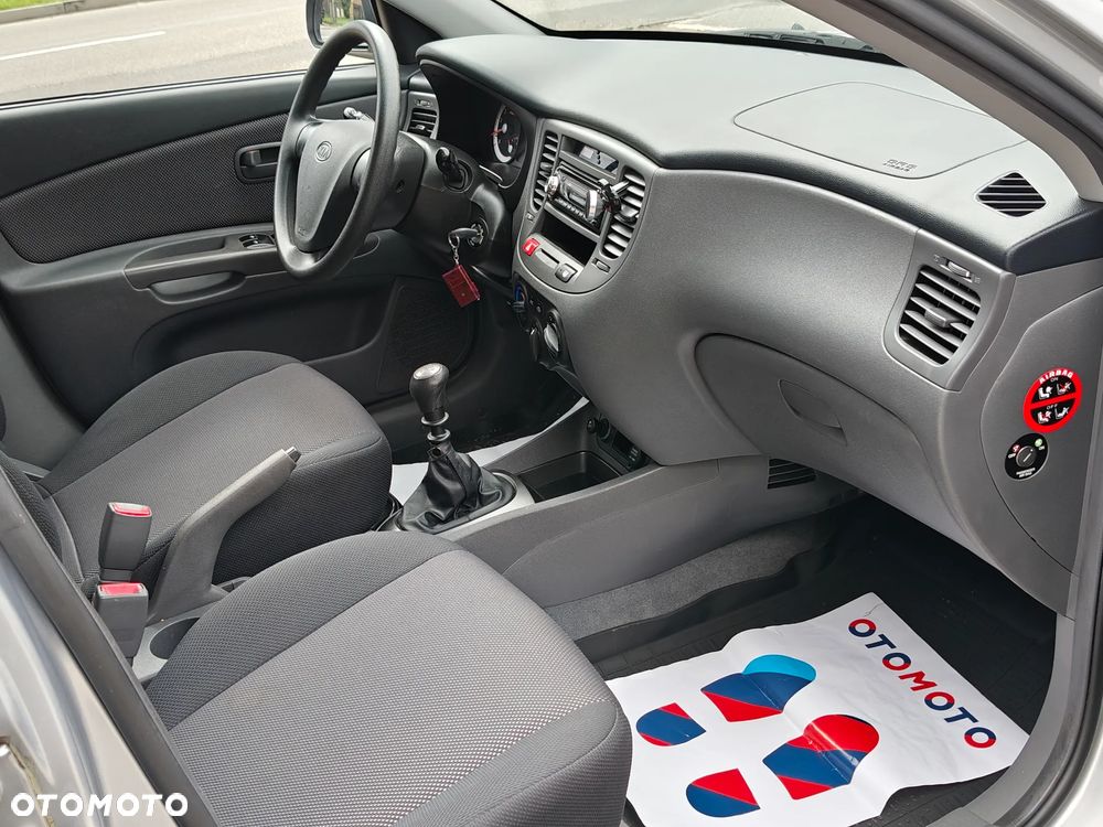 Kia Rio 1.4 Optimum + - 7