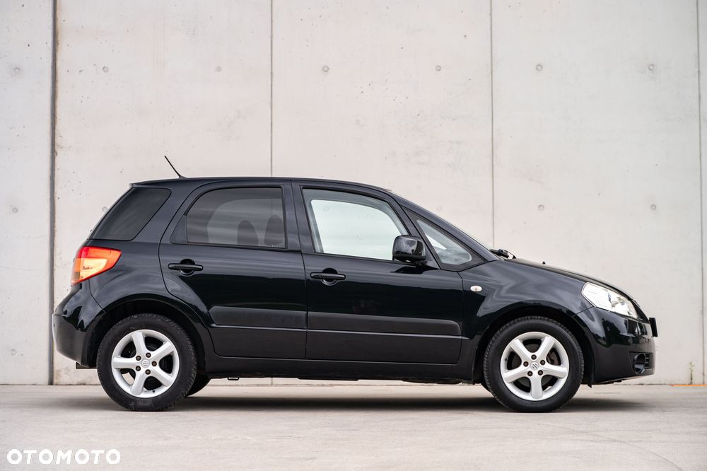 Suzuki SX4 1.6 GLX / Comfort - 27