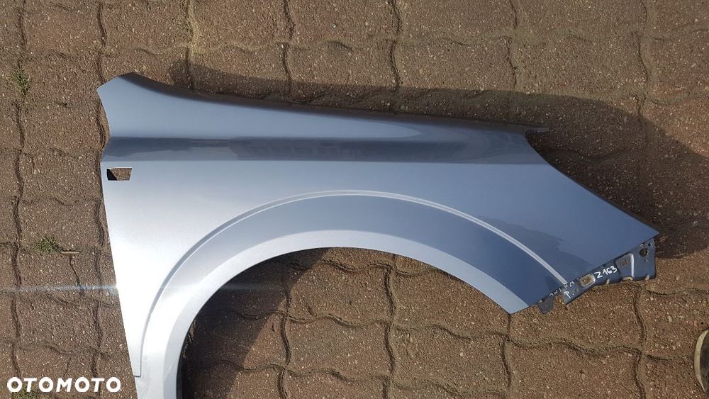 Błotnik przód  prawy  Opel Astra H III kod lakieru Z163 - 4