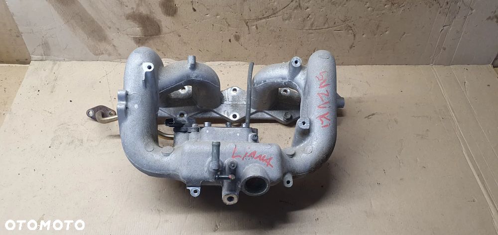 Kolektor ssący Suzuki Liana 1.6 16V E1T26571A - 1