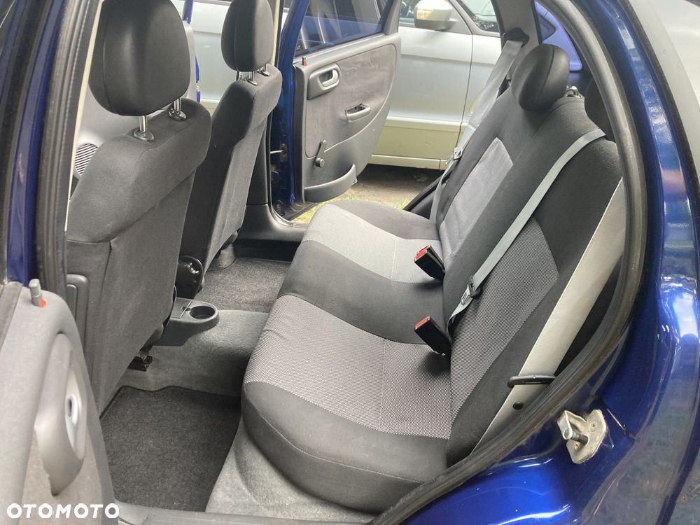 Opel Corsa 1.2 16V Cosmo - 8