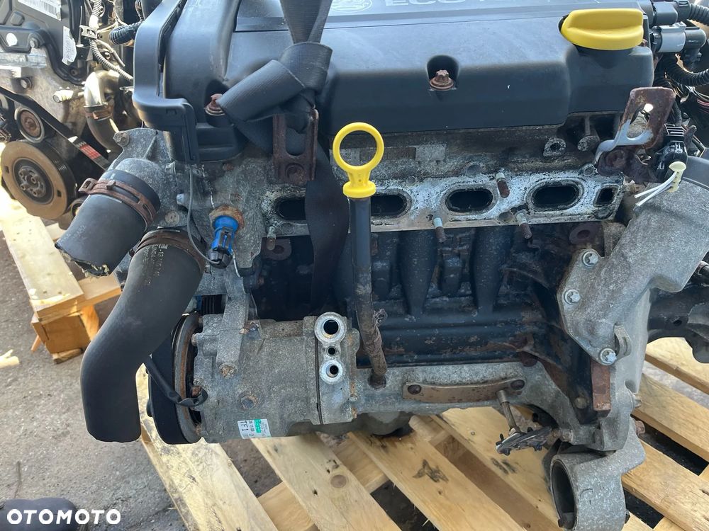 Silnik kompletny Z14XEP Opel Tigra Corsa D Astra H 1.4 16V 66kW 90PS film video rocznik 2009 - 5