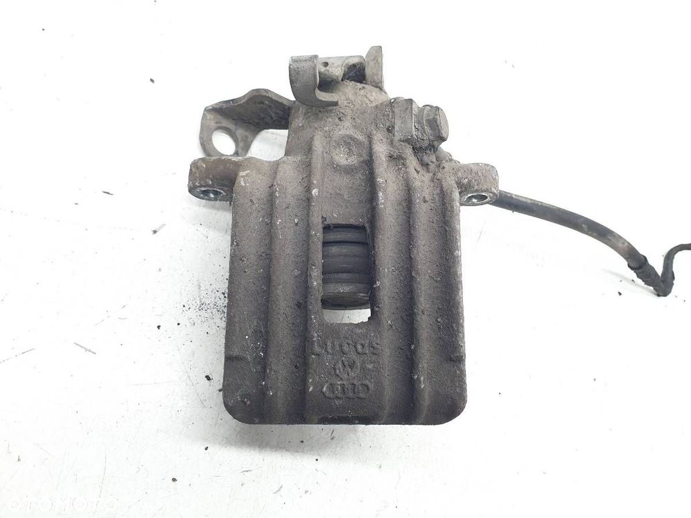 ZACISK TYŁ PRAWY SEAT TOLEDO II LEON I GOLF IV - 1