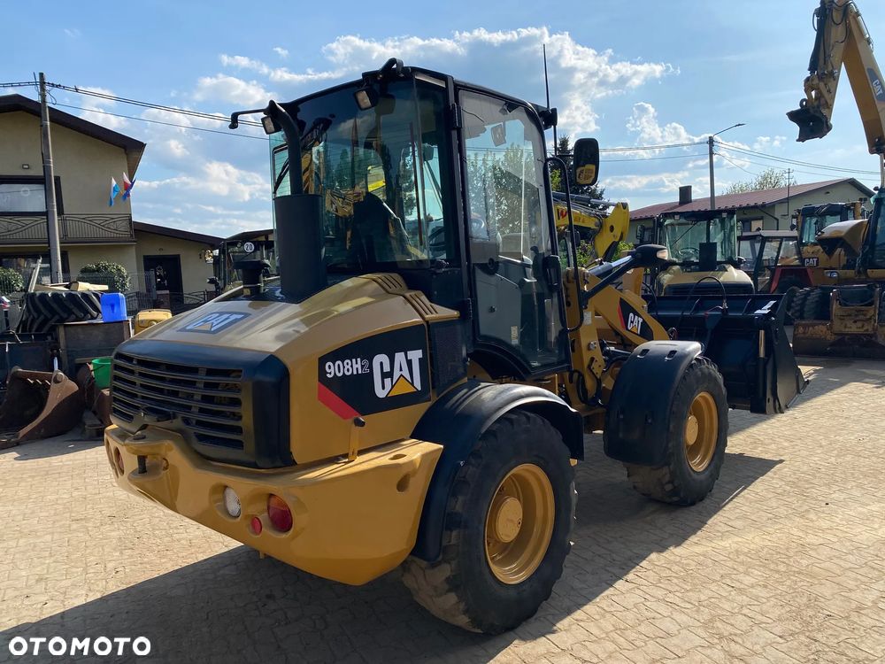 Caterpillar CAT 908H2, 2014 ROK, 6000 MTH, ŁYŻKA OTWIERANA + WIDŁY, z NIEMIEC, - 3