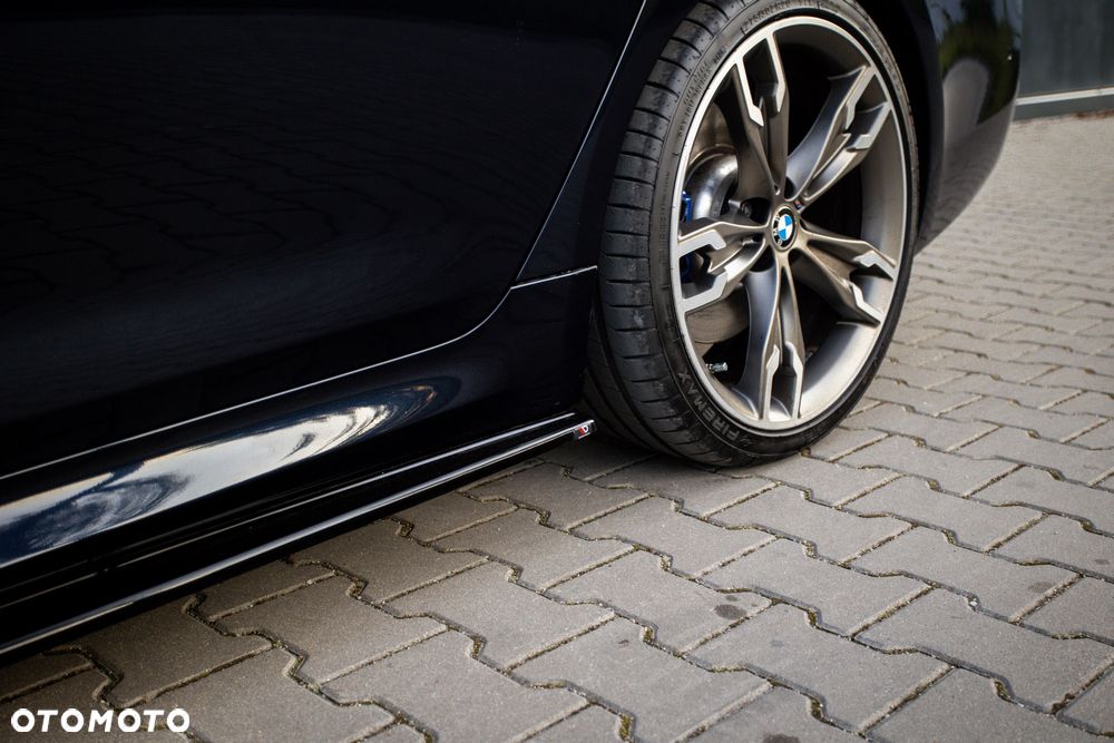 BMW Seria 5 M550i xDrive - 16