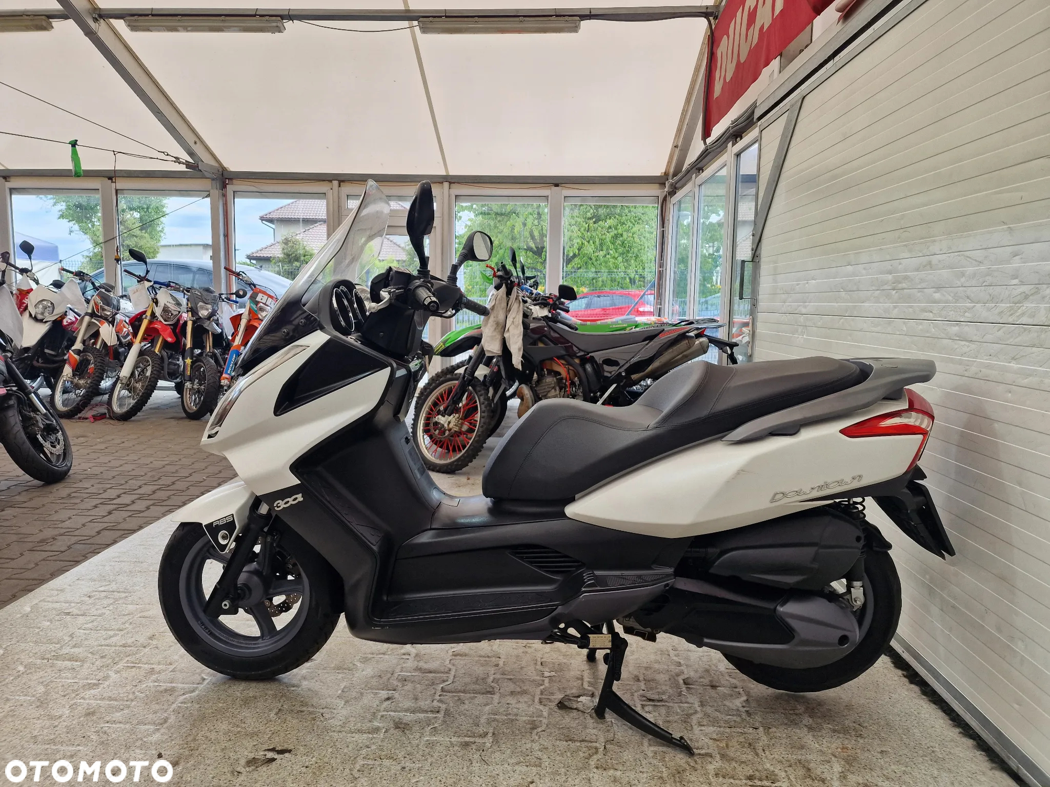 Kymco Xciting - 15
