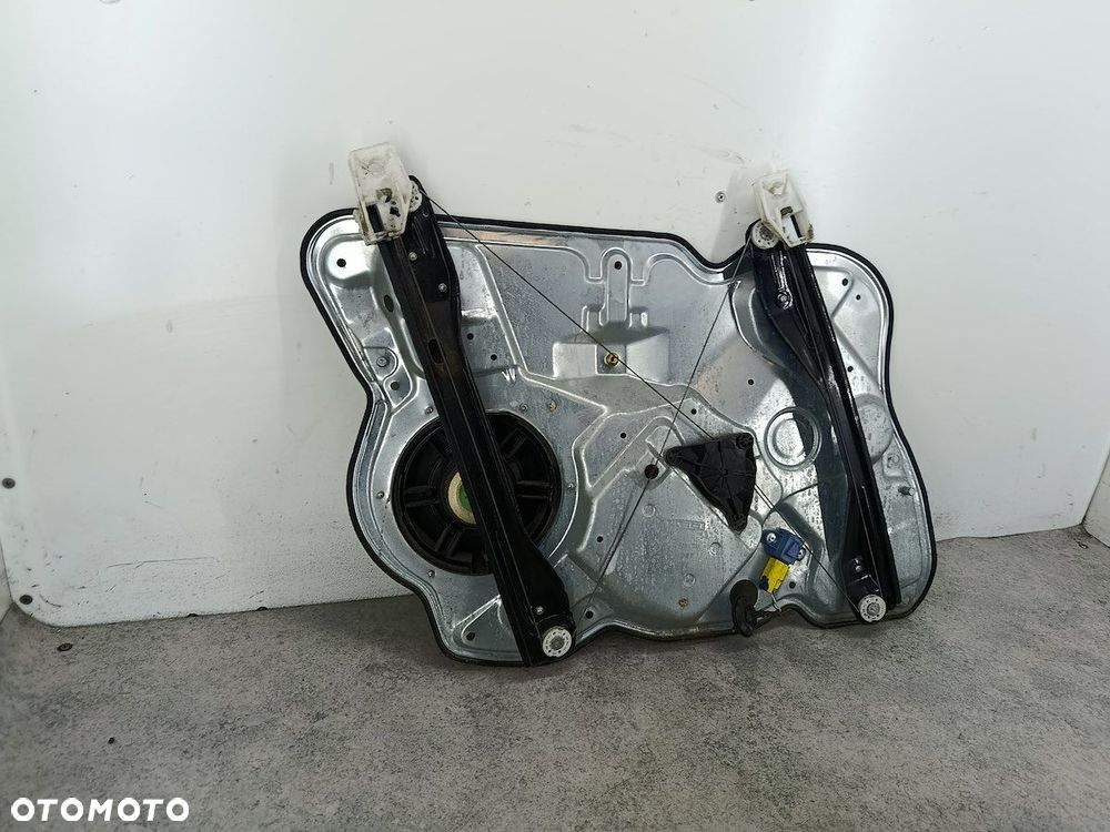 PODNOŚNIK SZYBY LEWY PRZÓD  SKODA OCTAVIA II 1T0959702B 1K0959792G LK - 7
