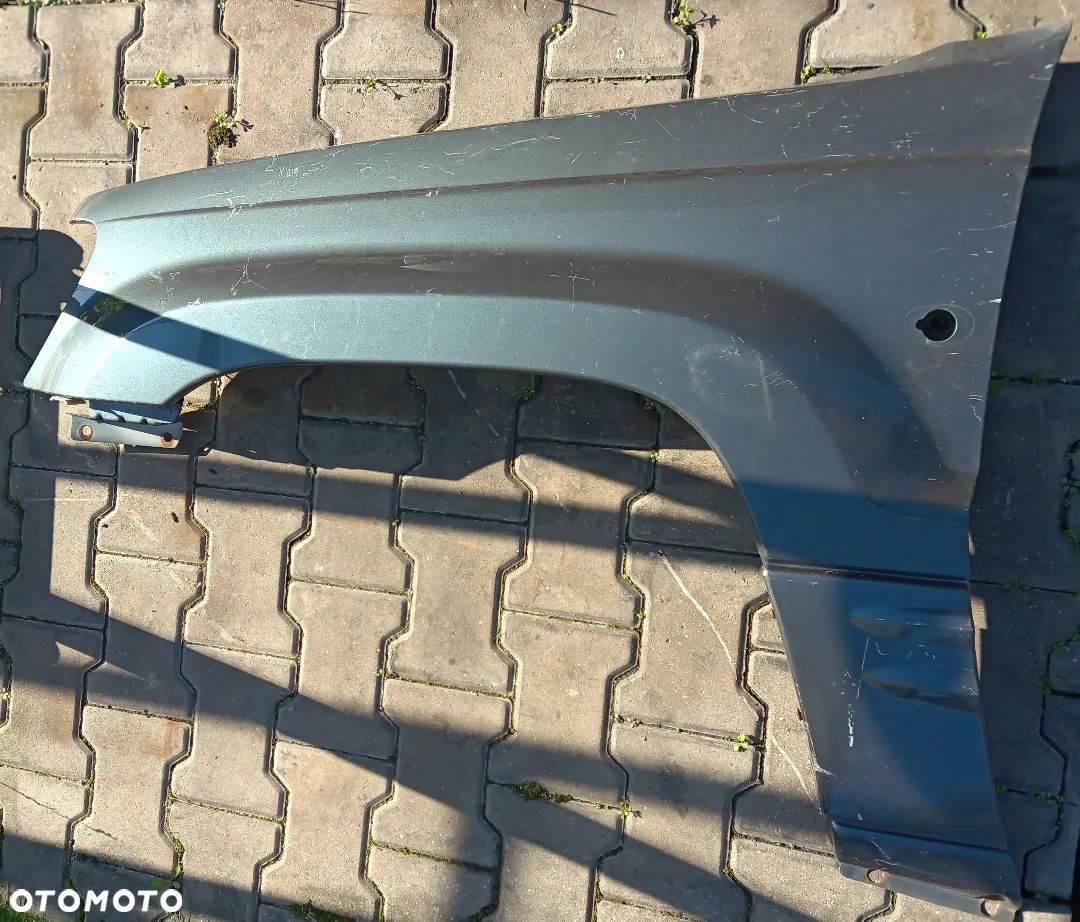 Jeep Grand Cherokee WJ 00-05 błotnik przod przedni lewy - 1