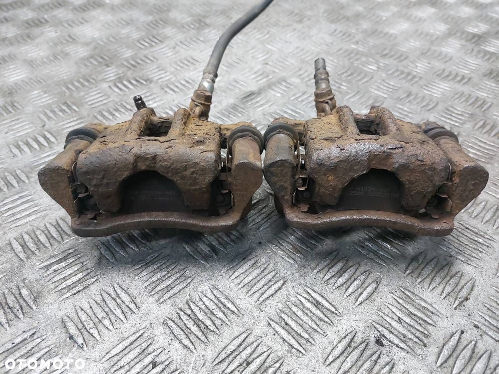 TARCZE HAMULCOWE TYŁ + ZACISKI TOYOTA COROLLA E12 1.6 16V - 9