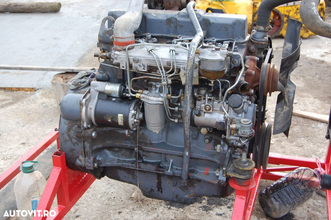 Motor buldoexcavator NEW HOLLAND - FIAT HITACHI - 2