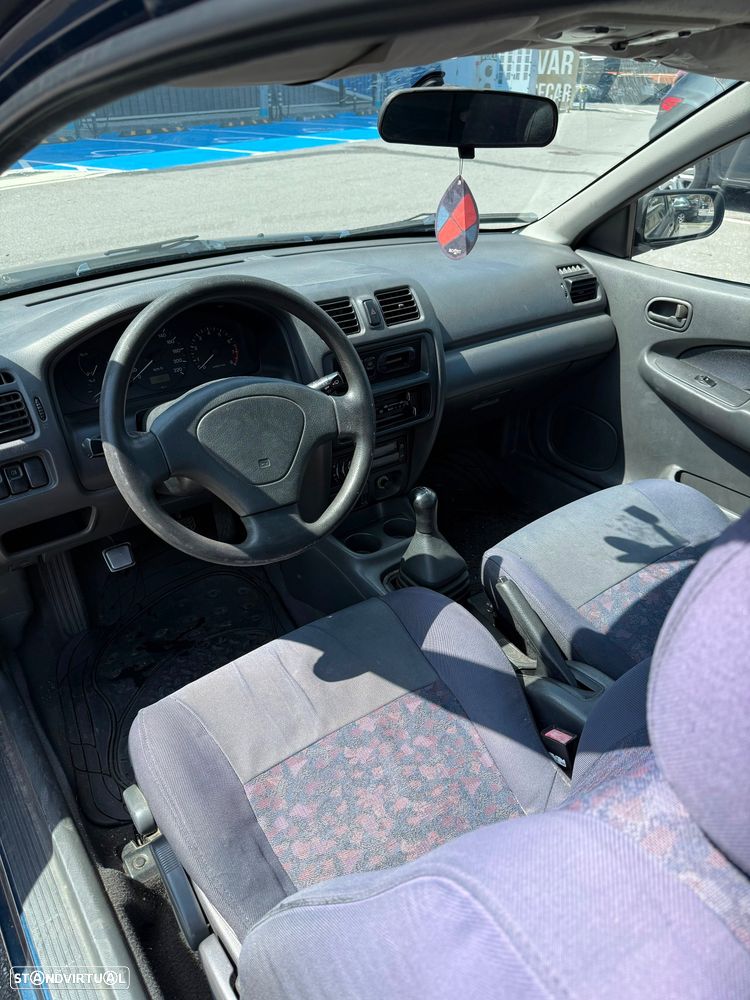 Mazda 323 P 1.3 - 11