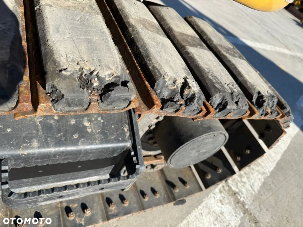 Caterpillar 310 - 29