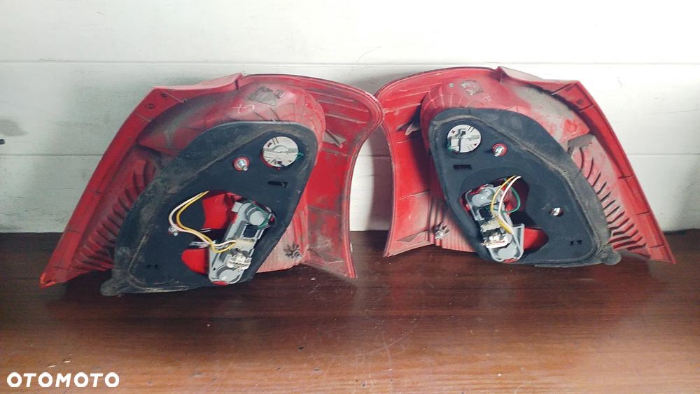 Lampa lewy prawy przód tył Toyota Yaris II 5D - 13