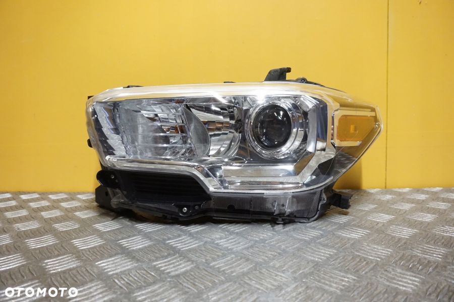 TOYOTA TACOMA 2016- REFLEKTOR LAMPA SOCZEWKOWA BEZ LED JASNA LEWA USA - 1