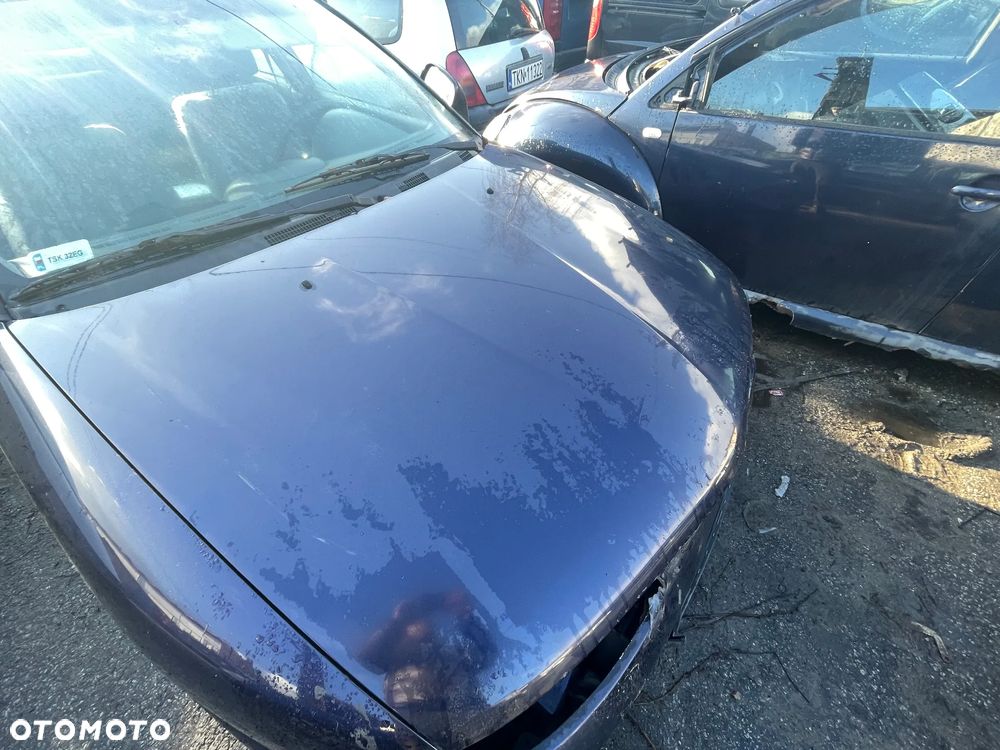 DRZWI KLAPA SZYBA ZDERZAK LAMPA I INNE MITSUBISHI CARISMA T46 - 1