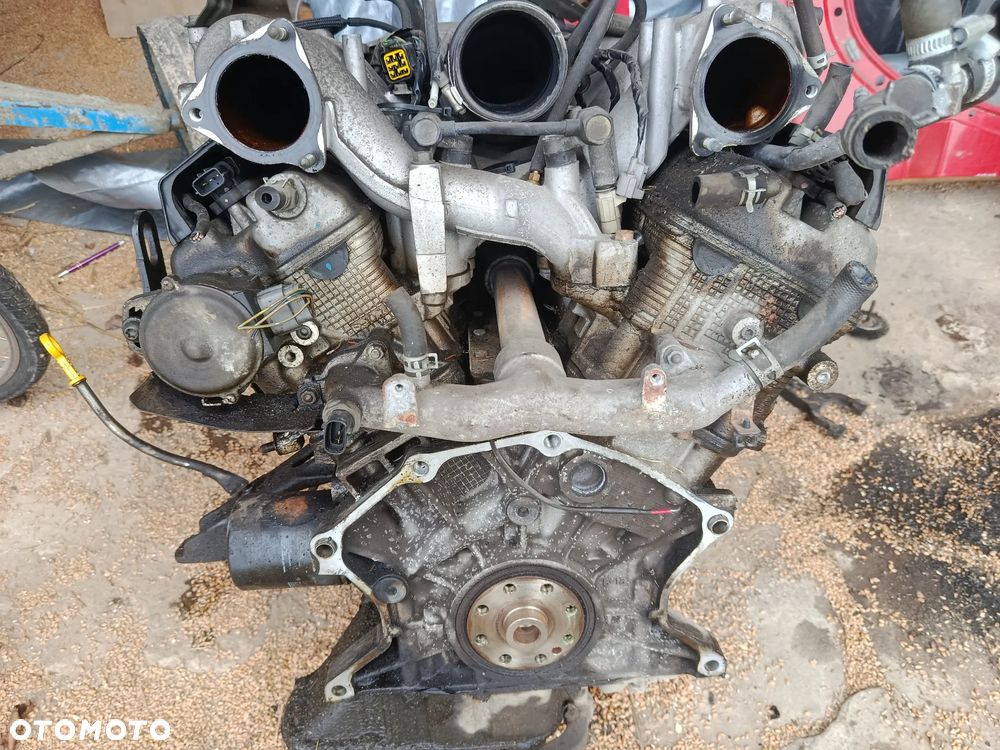 Silnik słupek Suzuki grand Vitara 1 2.7 v6 xl7 - 2