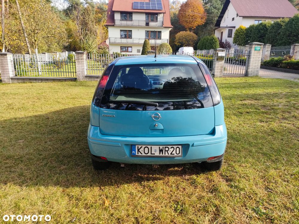 Opel Corsa 1.0 12V Cosmo - 4