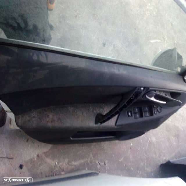 ELEVADOR FRENTE ESQUERDO MAZDA 3 - 1