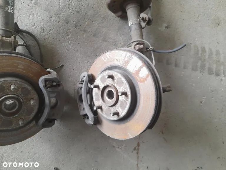 Zwrotnica amortyzator prawa lewy Macpherson przód Nissan Nissan Juke F15 1.6 2.0 b - 4